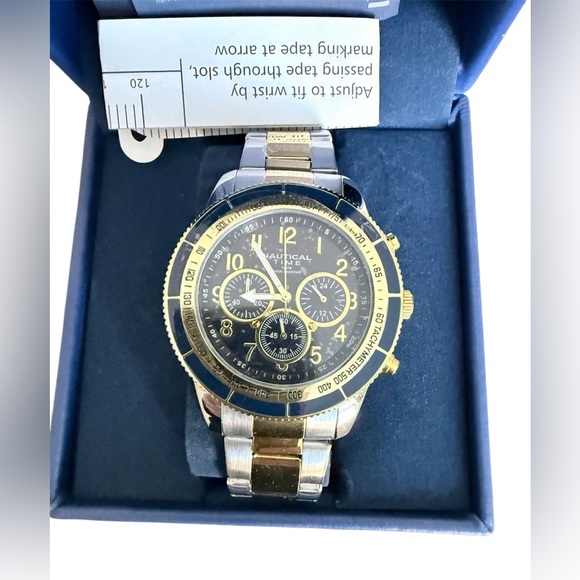 NIB Nautical Time men’s silver and gold toned stainless steel quartz watch